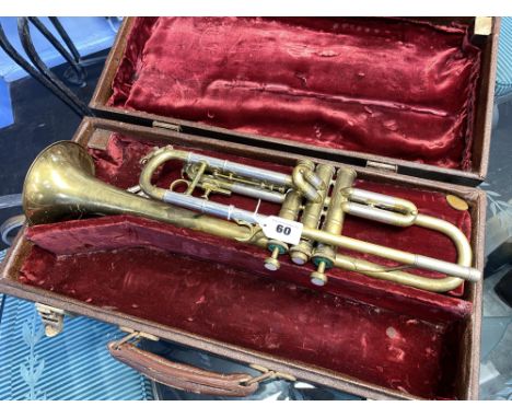A cased Boosey and Hawkes of London trumpet, engraved 'Emperor'