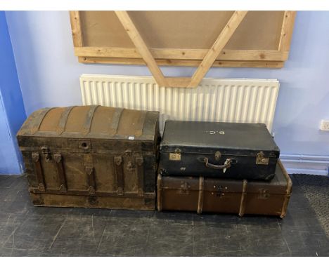 A domed top trunk and two cases