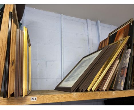 Shelf of pictures and prints, assorted