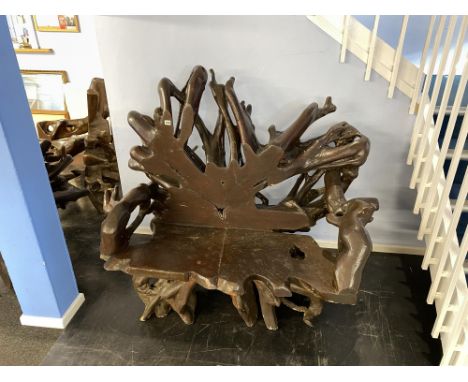 A large two seater root bench, three smaller root garden chairs and a root table