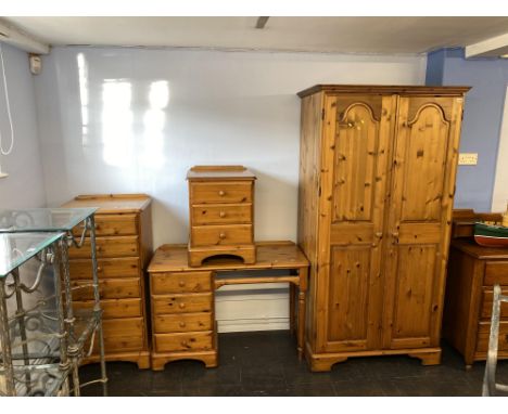Two pine chest of drawers, dressing table and wardrobe