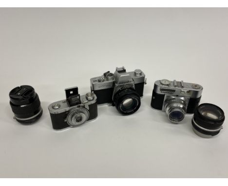 A Minolta SRT100b, a Tenax Zeiss Ikon, Nikon lenses etc.