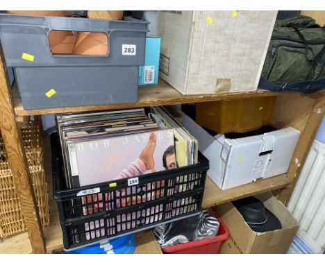 LPs, camera, Scalextric track and  box of tools.