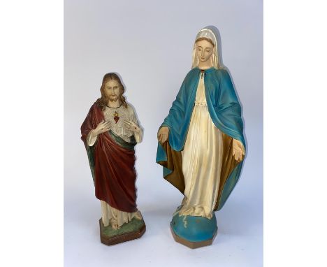 Two Religious chalkware statues depicting Christ and Madonna, the largest measures 66cm H