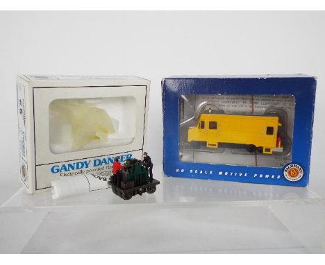 Bachmann - 2 x boxed HO gauge models, a Rail Detector Step Van # 46204 and a Gandy Dancer hand car # 46202. Both models appea