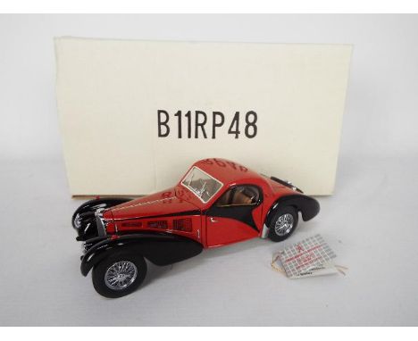 Franklin Mint - a 1:24 scale diecast model Bugatti Atalante (1936), red, # B11RP48, appears mint in box with internal poly pa