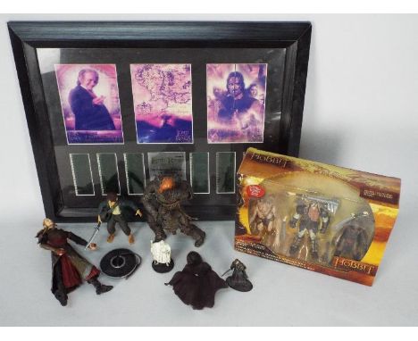 Lord Of The Rings - A framed Lord Of The Rings trilogy, limited edition filmcel presentation, numbered 539/1000, with certifi
