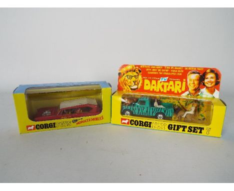 Corgi - Two Corgi Toys models comprising # 277 Monkee Mobile and Corgi Gift Set 7 Daktari, both show signs of play wear and a