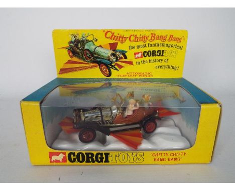 Corgi - A boxed Corgi Toys # 266 Chitty Chitty Bang Bang with front and rear wings and all four figures, model appears VG in 