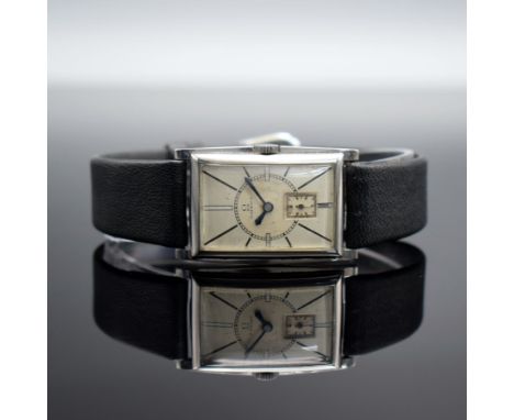 OMEGA schöne rechteckige Armbanduhr in Stahl,   Schweiz um 1935, Handaufzug, Boden aufgedr., silb. Duoton-Zifferbl. pat., geb