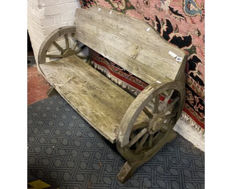 SMALL TEAK WAGON WHEEL BENCH