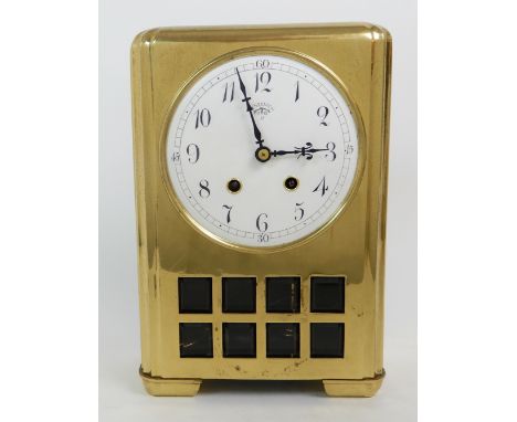 A LENZKIRCH AESTHETIC DESIGN BRASS CASED MANTLE CLOCK the front of the case with eight glass square panels, the white enamel 