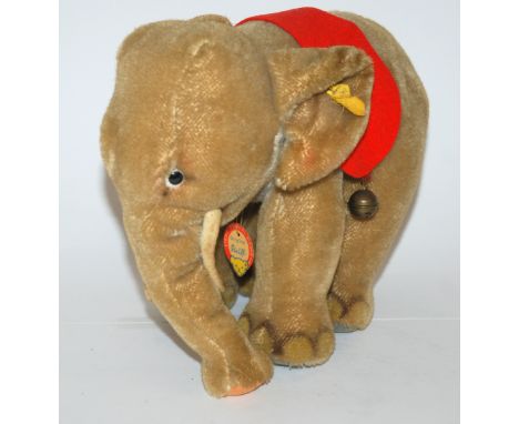 SEVEN VARIOUS STEIFF ANIMALS comprising, Elephant, Tiger, Okapi, Paddy, Nagy, deer and Grissy with chest tags and labels, 27c