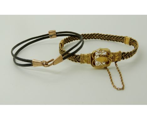 TWO ELEPHANT HAIR BANGLES the first with plaited design twisted wire work and filigree clasp and spacers, inner diameter appr
