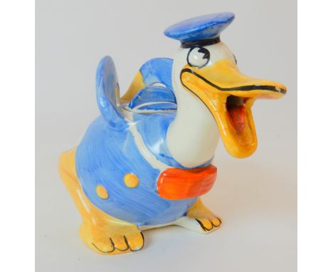 A WADE HEATH FOR WALT DISNEY DONALD DUCK NOVELTY TEAPOT with printed marks to base, 11cm high Condition Report: Has remnants 