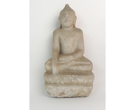 AN INDIAN WHITE MARBLE STATUE OF BUDDHA seated in lotus position on a high raised lotus throne, 39cm high Condition Report: A