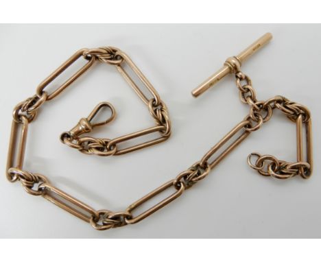 A 9CT GOLD FANCY ALBERT CHAIN hallmarked Chester 1895, stamped 9ct 375 to every link, clasp and 'T' bar. Length 35.5cm, weigh