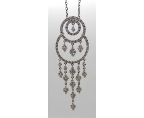 AN 18CT WHITE GOLD DIAMOND CIRCLE FRINGE NECKLACE Italian made and retailed by Eric Smith of Newton Mearns. Set with estimate