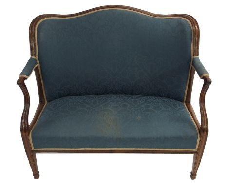 A WALNUT SALON SOFA UPHOLSTERED IN BLUE FABRIC with six square tapering legs, open carved arms with shaped back, 114cm high x