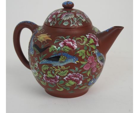A CHINESE YIXING TEAPOT AND COVER enamelled with exotic birds amongst flowers, signed to base, 11cm high Condition Report:min