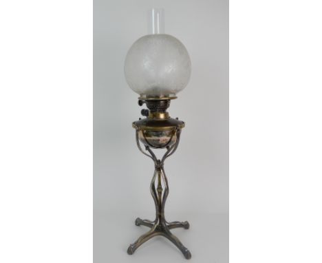 A W.A.S. BENSON ART NOUVEAU BRASS, COPPER AND SILVER PLATE OIL LAMP the reservoir marked with Evered & Co Ld Patent, the knob