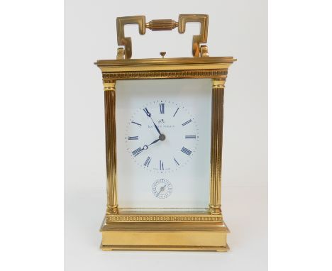 A FINE 20TH CENTURY BRASS-CASED REPEATER CARRIAGE CLOCK the white enamel dial with Roman numerals and signed Matthew Norman (