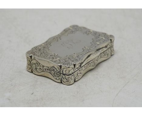 A Victorian engraved snuff box, by George Unite, Birmingham, 1853, 61mm. Condition - fair