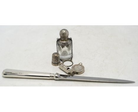 A late Victorian novelty propelling pencil modelled as two coins mounted on a central boss, diameter 24mm, together with a sm