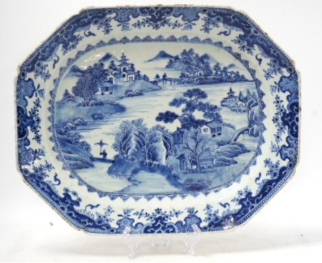 An 18th century Chinese octagonal export blue and white dish, 41cm wide. Condition - fairSeries of small chips around rim, on