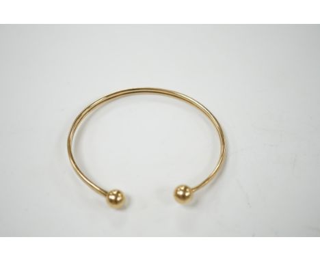 A 9ct gold torque bangle, 4.7 grams. Condition - fair to poor