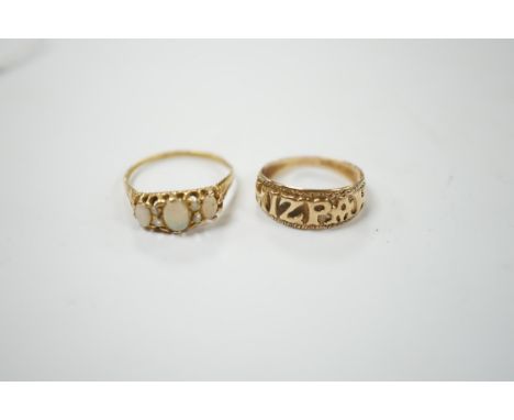 A 9ct gold 'Mizpah' ring and a yellow metal, three stone white opal set ring, with diamond chip spacers, size P, gross weight