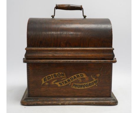 An oak cased Edison Standard phonograph, 28.5cm high. Condition - fair There are no cylinders or winding handle. Everything i