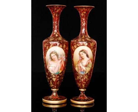 A large pair of 19th Century Bohemian vases in the manner of Moser each of footed, slender shouldered ovoid form with flared 