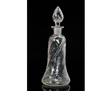 An early 20th Century Stevens &amp; Williams clear crystal glass decanter of slender wrythen fluted bell form with a hollow b