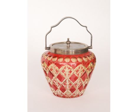 An early 20th Century Stevens & Williams cased crystal glass biscuit barrel of ovoid form, cased in ruby over citron and flas