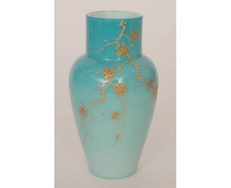 A late 19th Century Harrach vase of shouldered ovoid form with collar neck, cased in a dye away pale blue to white with opal 