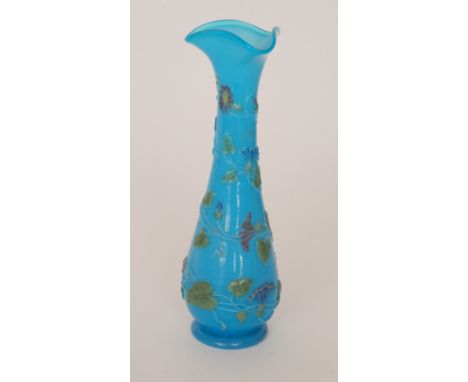 A 19th Century Baccarat blue opaline vase, circular foot rising to a slender bottle form with triform rim, relief moulded wit