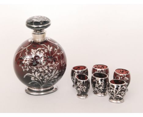 A 1930s Italian decanter set comprising footed compressed ovoid decanter with collar neck and domed mushroom form stopper, to