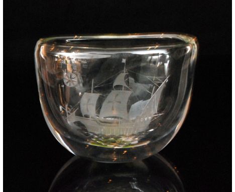 A mid 20th Century Kosta glass vase of elongated oval form decorated with an engraved galleon and compass, the base with a gr