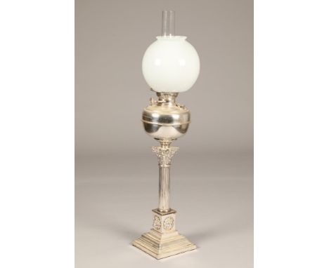 Electro plated silver paraffin lamp, Corinthian column with applied lion masks, converted to electricHeight 58cm excluding sh