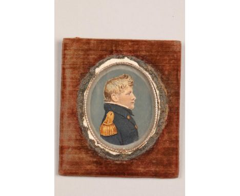 A 19th century portrait miniature, depicting a male Naval Officer, mounted in a velvet cushion frame 6.5cm x 5.2cm