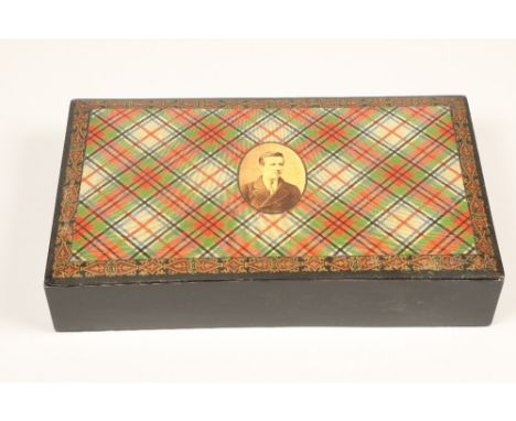 Large Mauchline tartan ware box, with a black and white portrait of Alec Smith to coverLength 33cm, Width 19.5cm, Height 7cm 