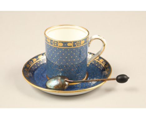 Boxed set of six porcelain coffee cups and saucers, decorated with blue background and gilt decoration, complete with six hal
