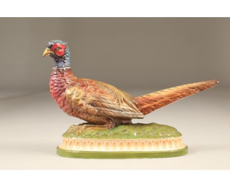 Ceramic Pheasant by Fieldings, impressed Fieldings ‘38 on base. Diameter 38 cmCONDITION REPORTSlight crazing otherwise in goo
