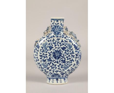 19th century Chinese blue and white moon flask, Qing Dynasty, circa 1880, fully decorated with floral scroll patterns, dragon