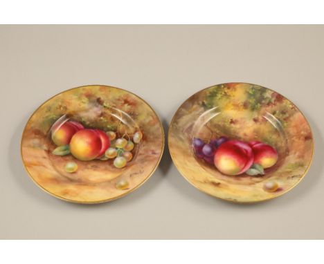 Pair of Royal Worcester plates, decorated with hand painted fallen fruit, signed Mosely, date coded 1926 15.5cm diameterCONDI