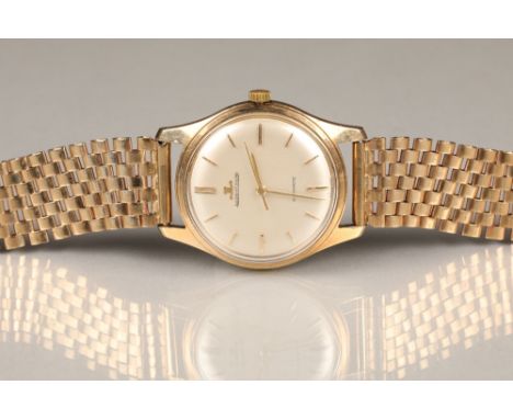 Gents 9 carat gold Jaeger-LeCoultre wristwatch, champagne dial with gilt baton hour markers, automatic movement, mounted to a