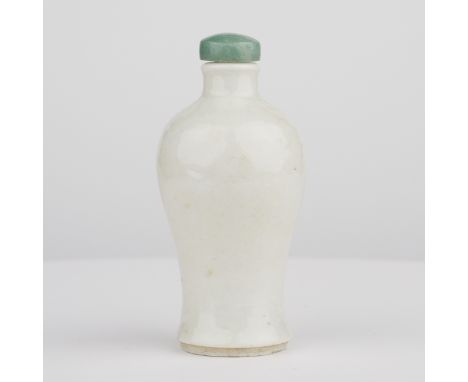 Chinese porcelain snuff bottle with a baluster form and jade stopper.Provenance: Collection of Bruce Dayton &amp; Ruth Strick