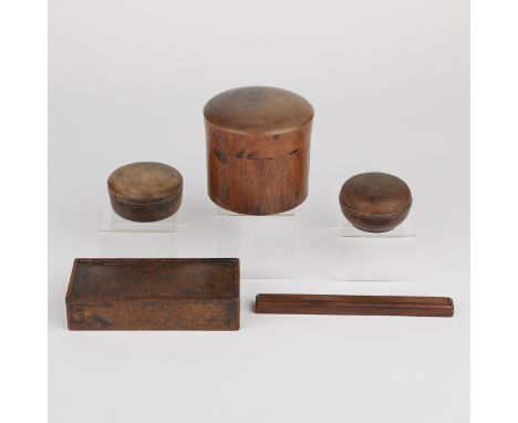 Group of five carved hardwood Chinese scholar's objects. The group is comprised of one brush box, one scroll weight, and thre