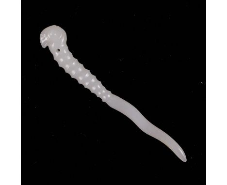 Chinese carved white jade ram head hair pin. With an undulating, partially ribbed form.Provenance: Collection of Bruce Dayton